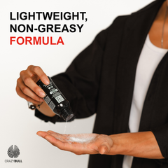 Person pouring Crazy Bull Space Dust hair texture powder on their hand to show that the product has a lightweight, non-greasy formula