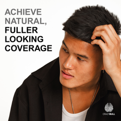 Person adjusting hair with text 'Achieve natural, fuller looking coverage' on a white background which is a product of Crazy Bull Lightning Fibers